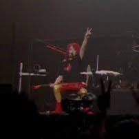 Hisashi Imai doing a peace sign